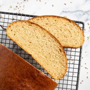 Slices of authentic Swedish limpa bread, ready to be served.