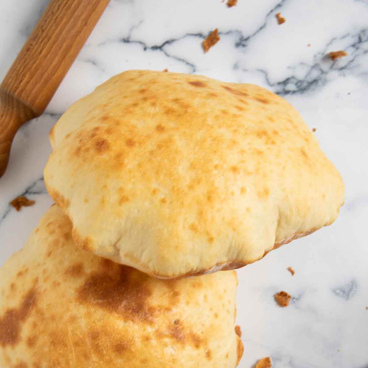 Lebanese pita bread fresh out of the oven, ready for serving.