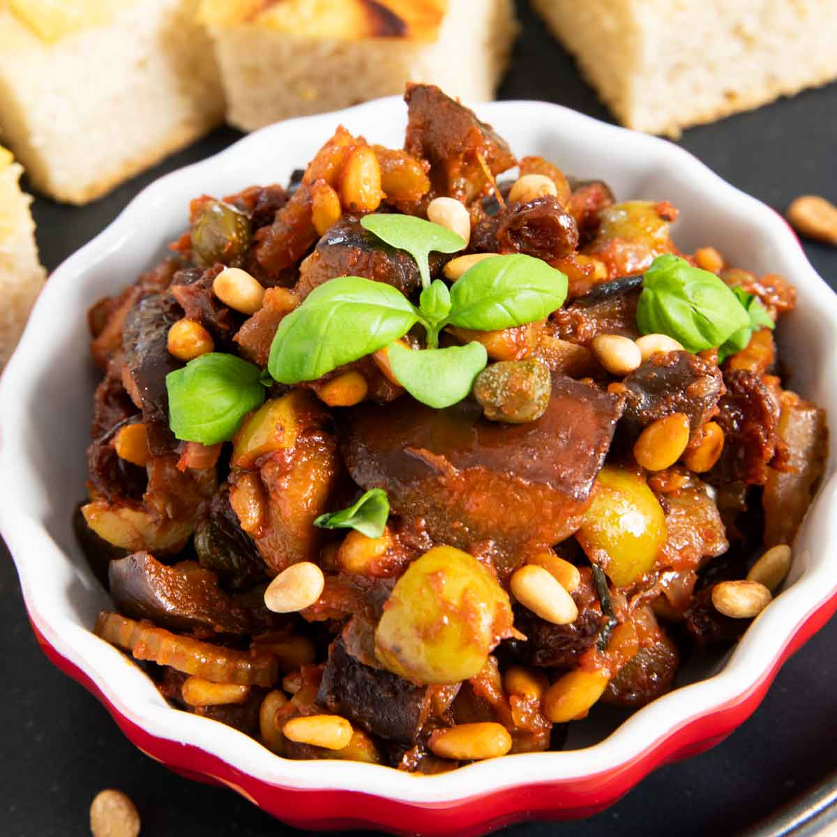 A serving of traditional caponata from Sicily, served as an appetizer.