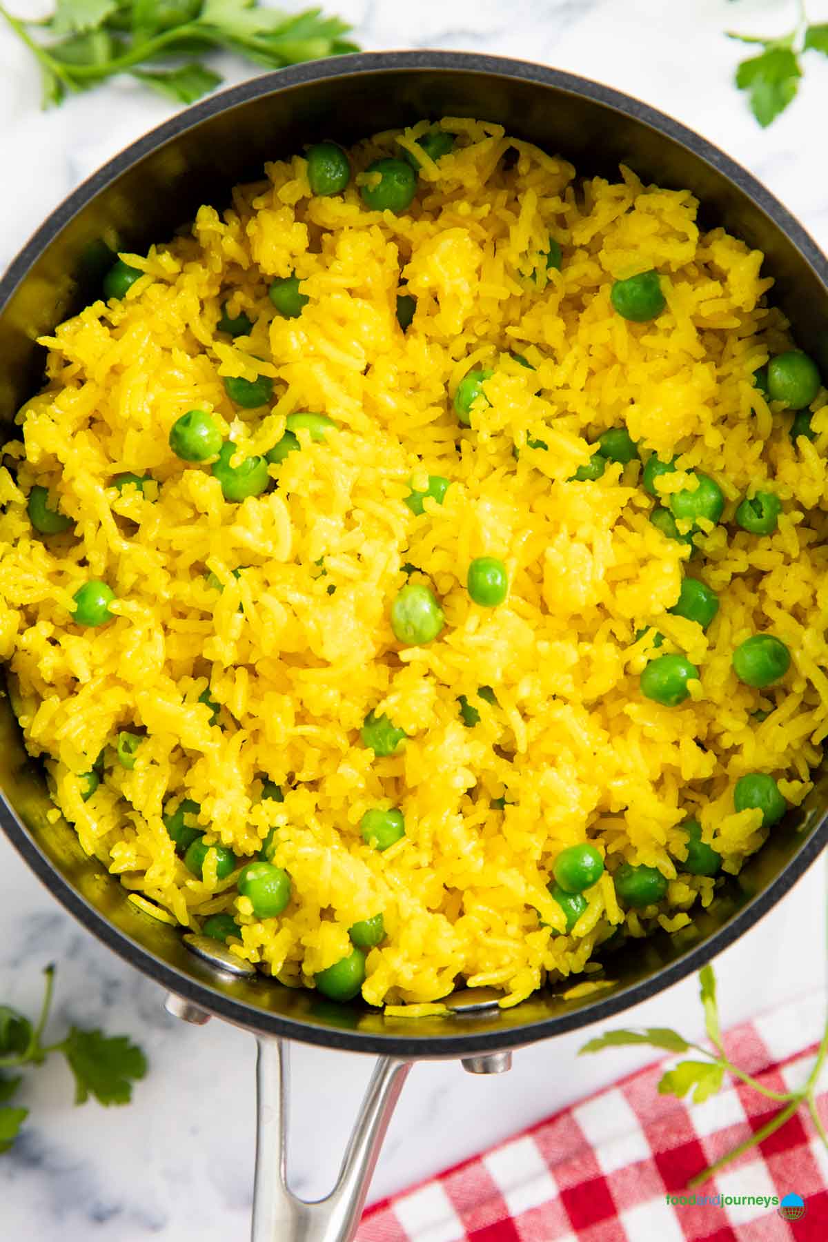 A pan of yellow rice, straight out of the heat.