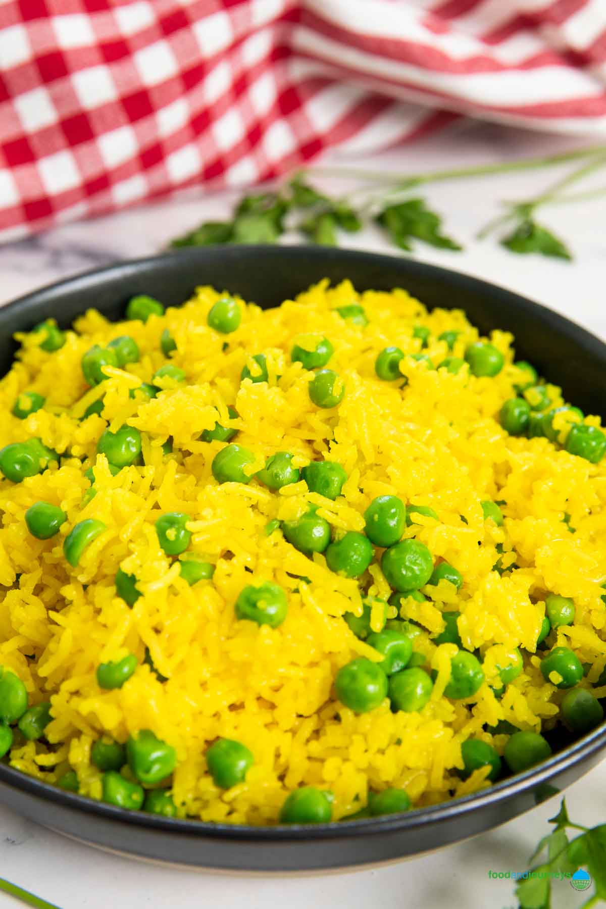 A closer shot of yellow rice, highlighting the fluffy texture of the rice.
