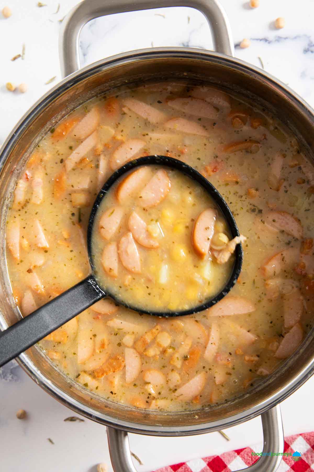 A pan of erbsensuppe, off the heat and ready for serving.
