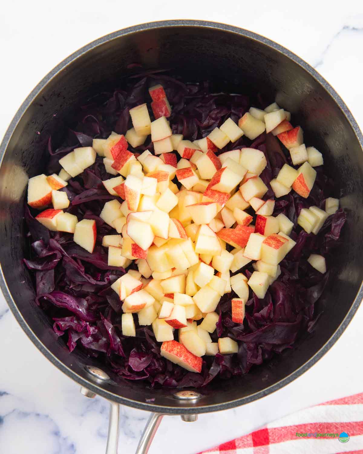 Adding bits of apple to the braised red cabbage adds a hint of delicate sweetness to the dish.