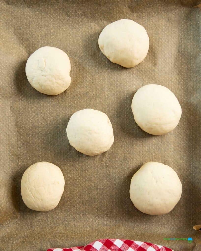 The stuffed Lebanese bun after filling it with caramelised onions and walnuts, ready for second proofing.