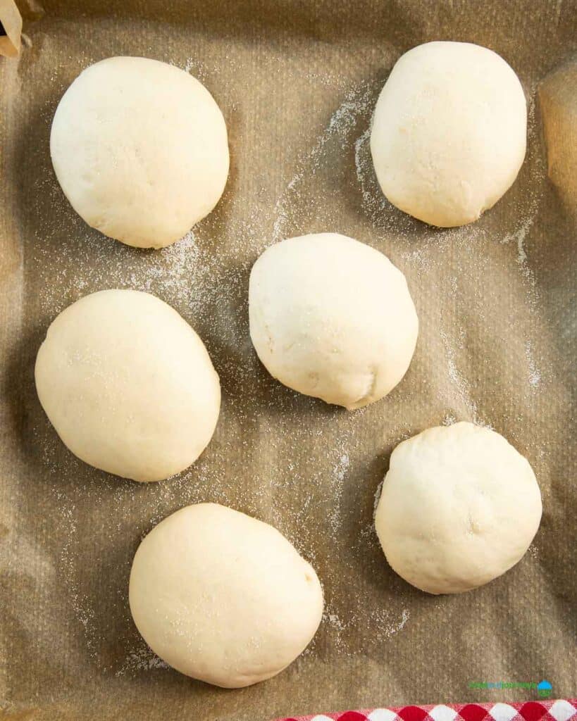 Lebanese stuffed bread after second proofing, read for baking.