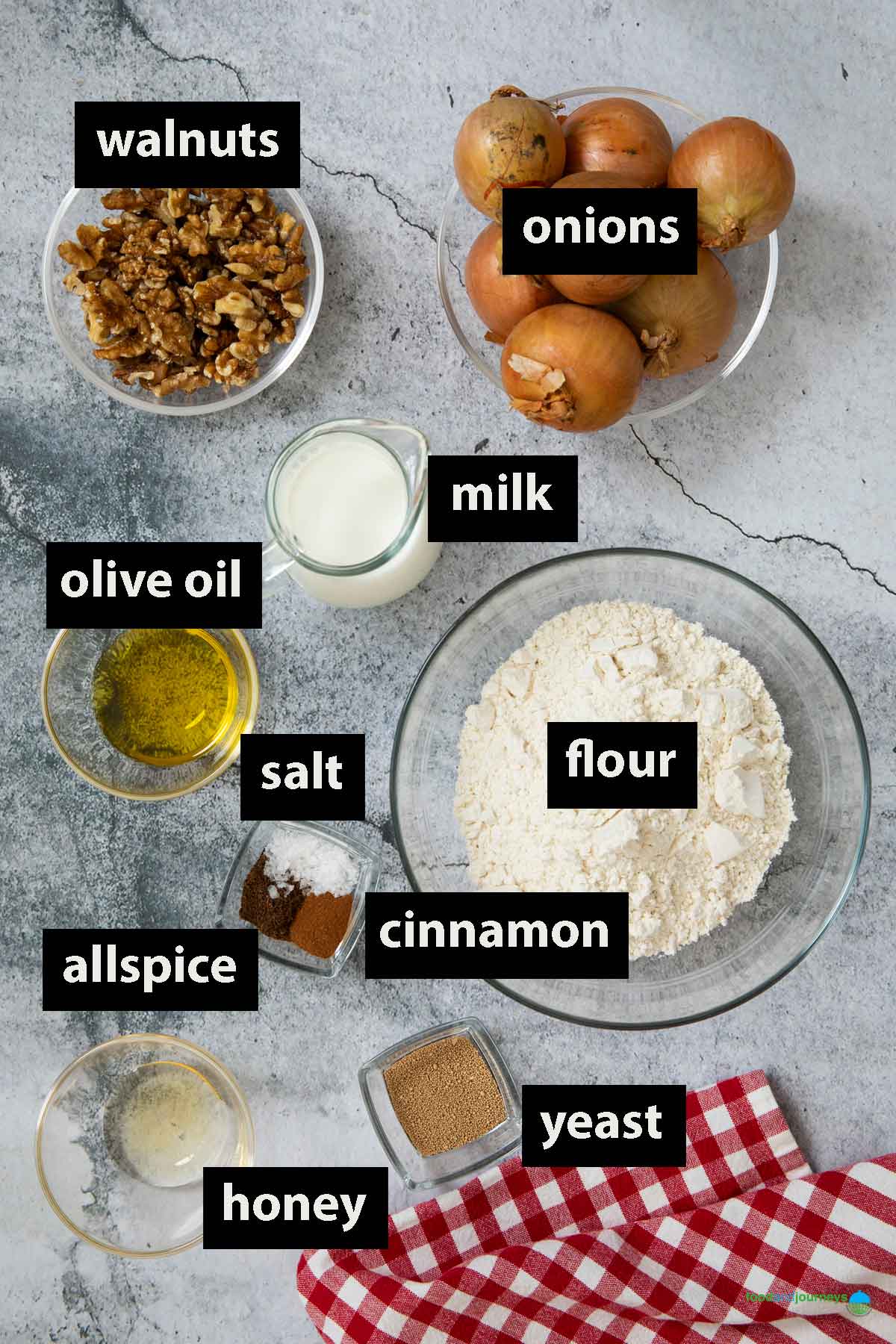 All the ingredients you need for a homemade Lebanese bread with onions and walnuts.